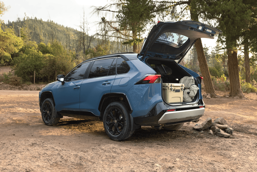RAV4 Hybrid XSE shown in Cavalry Blue with cooler trunk open